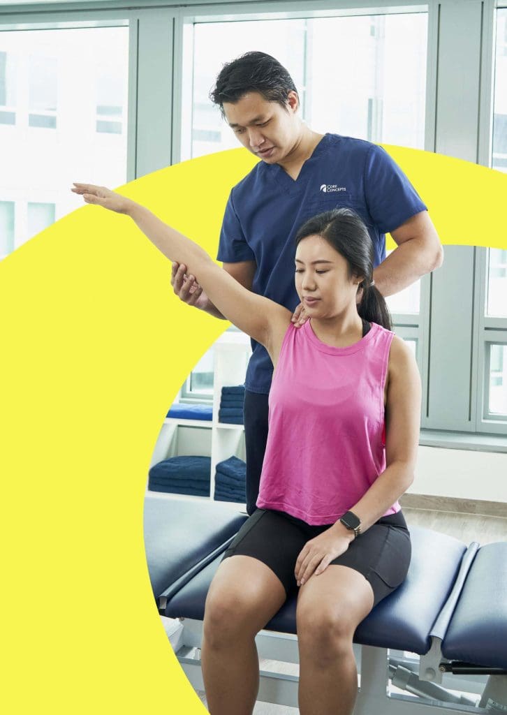 Physiotherapist testing shoulder mobility